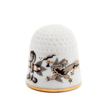 Reicher Drache, schwarz, goldschattiert, Goldrand, 2,5 cm | Meissen Fingerhut Kollektion