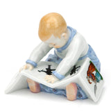 Miniaturhentschelkind, Mädchen mit Buch, Bunt staffiert, Struwelpetermotiv, H 7 cm | Meissen Miniaturen